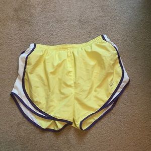 Size medium, dry fit Nike running shorts.